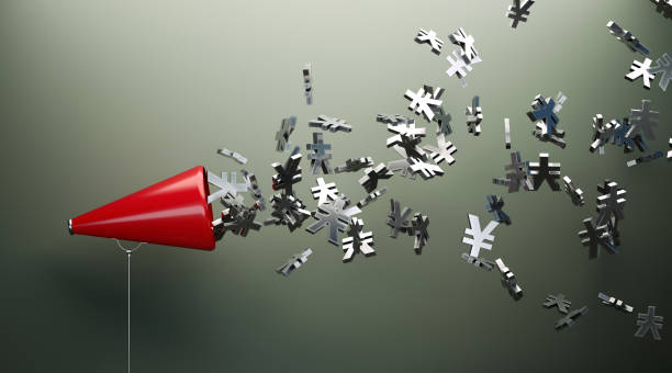 istock Red Megaphone And Silver Yen Signs In Front Of Gray Wall 1152208083