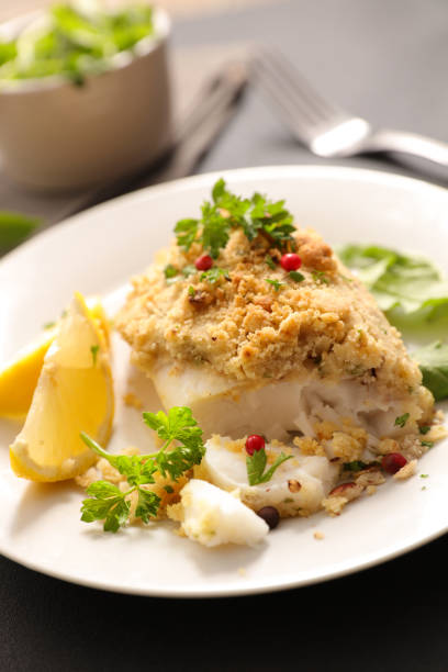 istock fish fillet cooked with crust , lemon and basil 1152209317