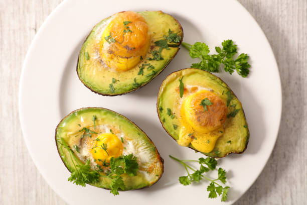 istock baked avocado and egg with parlsey 1152209538
