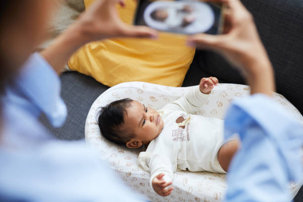 istock Serious baby in cozy cocoon 1152209755