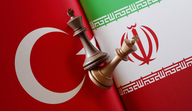 istock Iranian and Turkish Flag Pair with King Chess Pieces 1152209886
