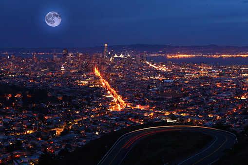 A Moon rising above San Francisco, California