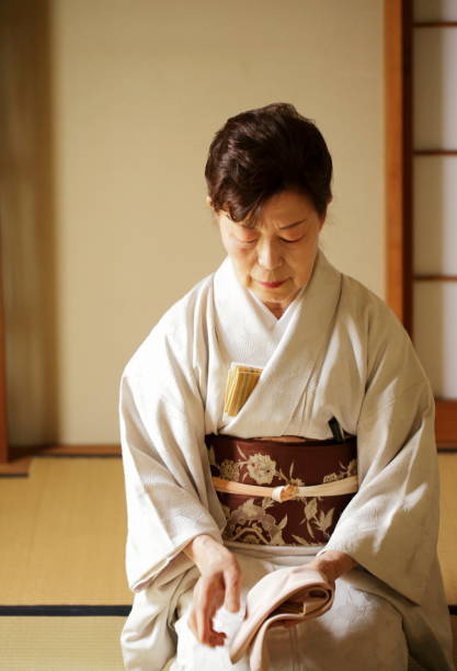 istock Senior woman wearing a kimono 1152215810