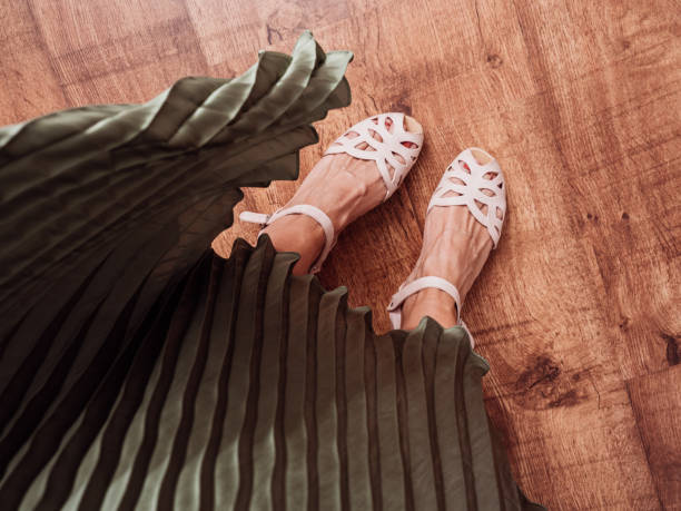 Sandal shoes and skirt from above