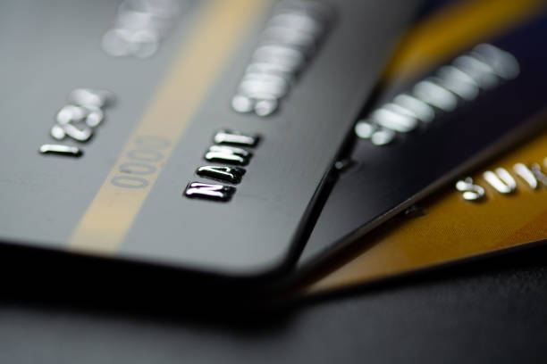istock Close up black credit card business background 1152217736