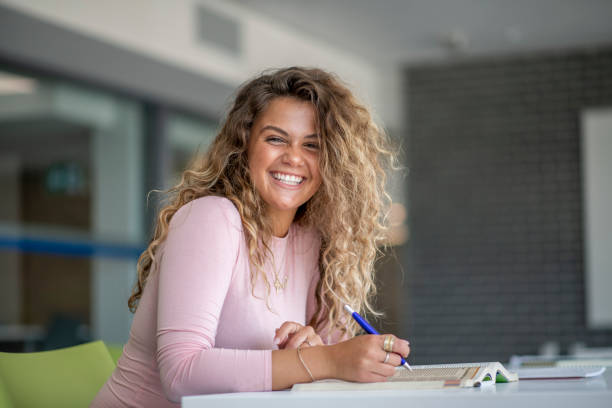 istock Attractive University Student Working on Homework 1152218701