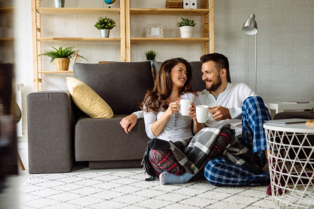 istock Loving couple relaxing at home 1152219711