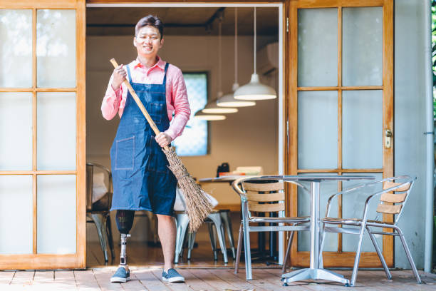 istock Amputee cafe owner getting ready to open his cafe 1152223741