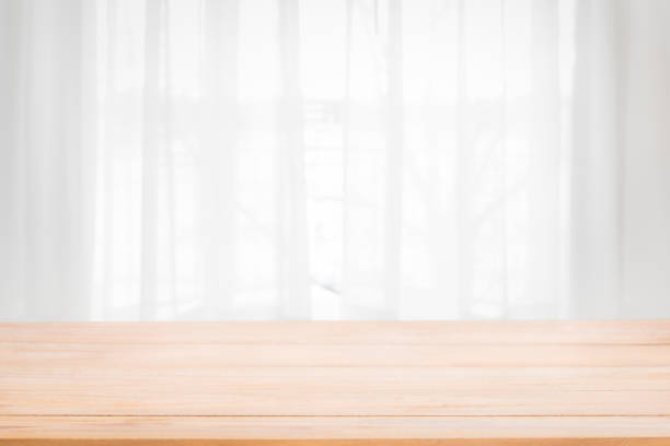 istock Blur curtain window and stationery box with sunlight. 1152225435