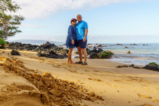 istock Senior couple together on Maui beach 1152226423
