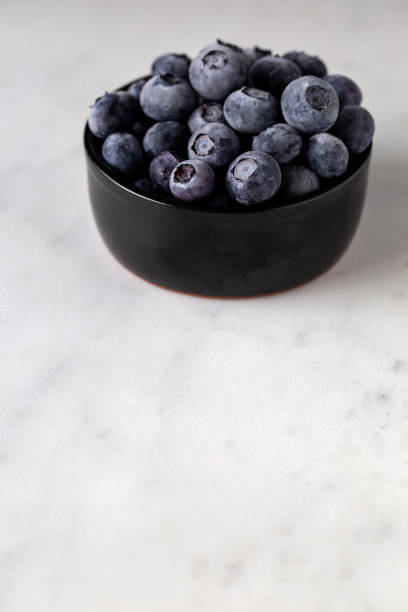 Blueberry's on white Marble stock photo