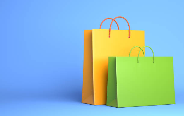 istock Two Empty Shopping Bags on the blue 1152227567