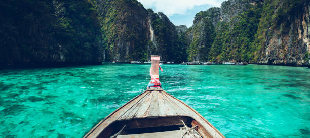 istock Long-tail boat travel to the island,Phi Phi Island,Blue sea 1152228160