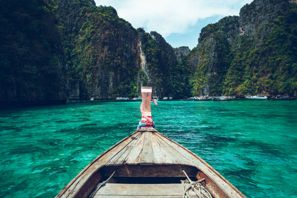 istock Long-tail boat travel to the island,Phi Phi Island,Blue sea 1152228403