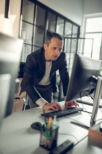 istock Prosperous businessman feeling overloaded in the office 1152229736