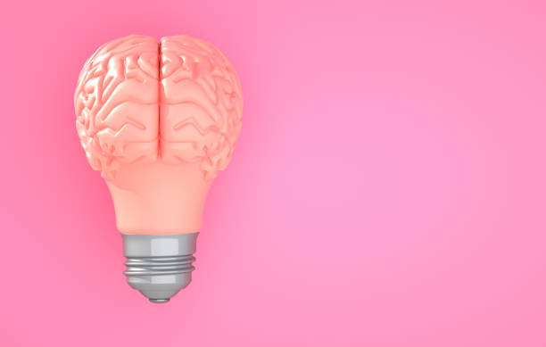 istock Pink brain light bulb on the color background 1152229800