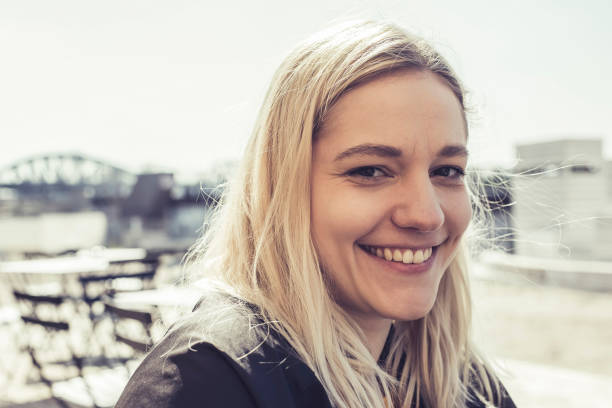istock happy young blond woman 1152230008