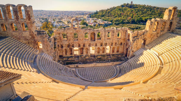 Theatre of Dionysus at Acropolis, Athens, Greece Theatre of Dionysus below the Acropolis in Athens, Greece is considered to be the worlds first theater aka Odeon of Herodes Atticus attica stock pictures, royalty-free photos & images