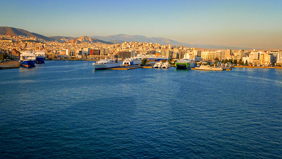 Port of Piraeus in Athens, Greece is the largest Greek seaport, ship logos removed or blurred for commercial use