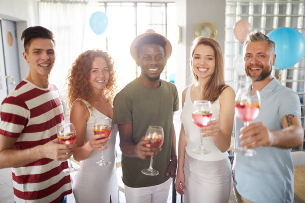 istock Group of Friends Posing at Party 1152231127