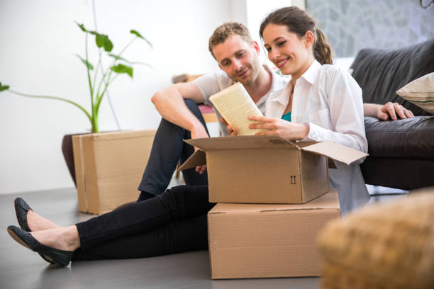 istock Young couple Moving Into a New House 1152232640