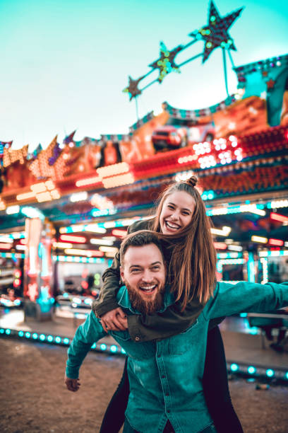 istock Boyfriend Giving Girlfriend A Piggyback Ride 1152238163