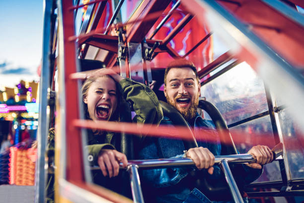 rollercoaster fun times !!! - montagne russe foto e immagini stock