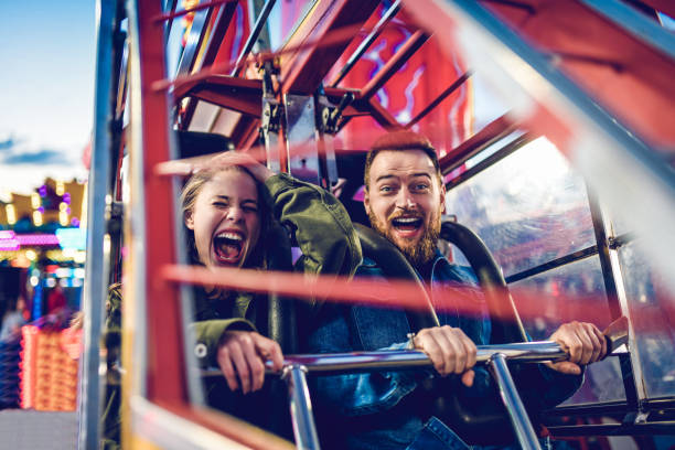 rollercoaster fun times!!! - lunapark treni stok fotoğraflar ve resimler
