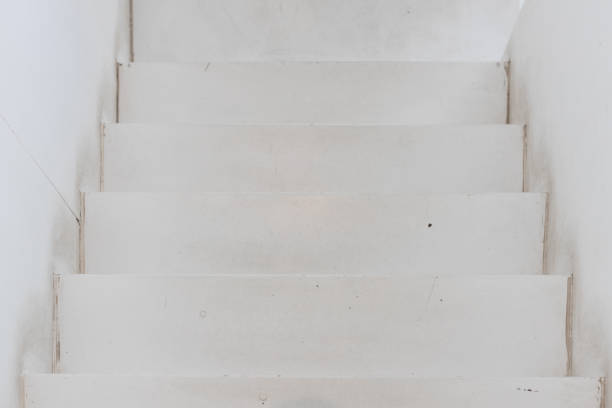 top view of empty old white woooden staircase.