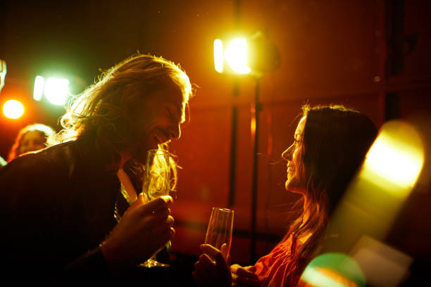 istock Man picking up girl at party 1152245992