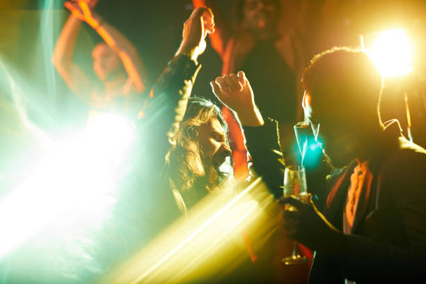 istock Emotional man dancing and singing at party 1152246008