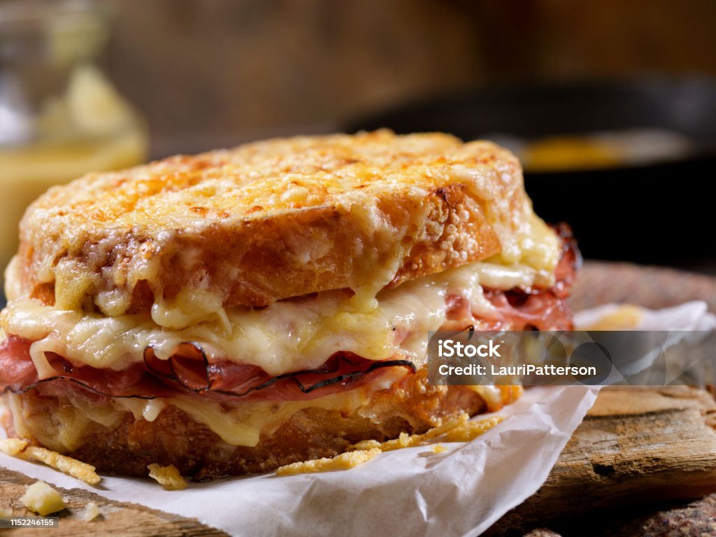 Croque Monsieur, Grilled Cheese Sandwich with Black Forest Ham, Gruyere and Bechamel Sauce Croque Monsieur Stock Photo
