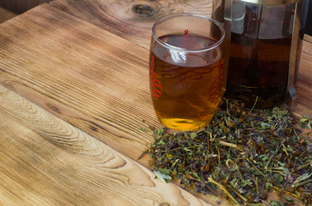 Glass with tea on the table