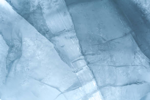 istock Ice texture background macro close up in sunlight. Beautiful abstract patterns of frozen water. 1152247327