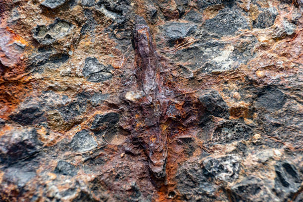 Rusty metal in the concrete