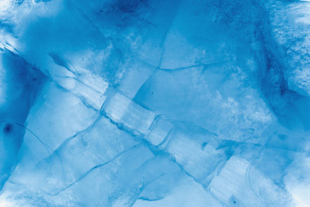 istock Ice texture background macro close up in sunlight. Beautiful abstract patterns of frozen water. 1152249279