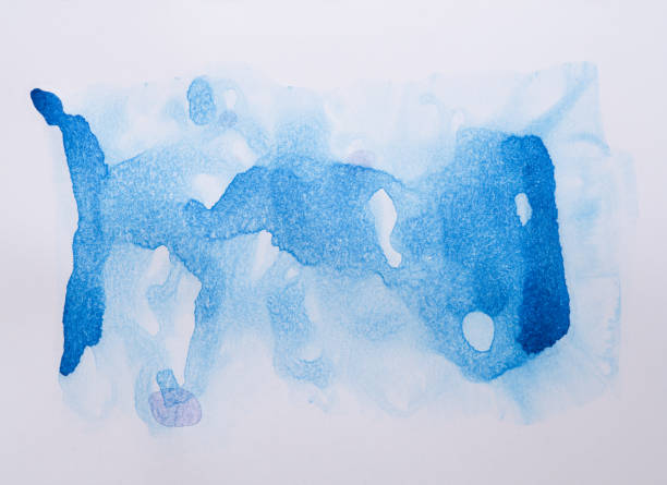 istock watercolor stain blue on a white background with paper texture. 1152250684