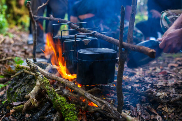 istock Boiler and small kettle is heated on a bonfire 1152255552