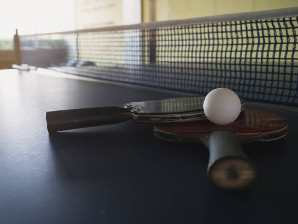 istock Old table tennis rackets and balls 1152256926