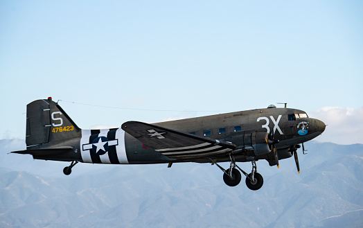 Douglas C-47 Dakota troop transport on take off roll. \nChino, California. May 6, 2019.