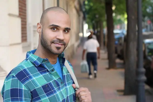 Middle Eastern man outdoors close up.