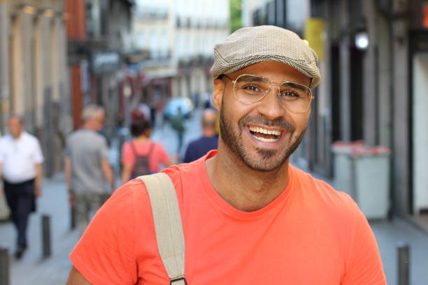 istock Ethnic man laughing out loud outdoors 1152263716