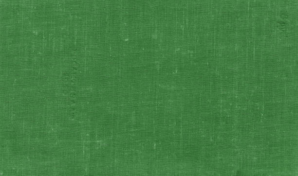 istock Old grungy canvas pattern with dirty spots in greren color. 1152267209