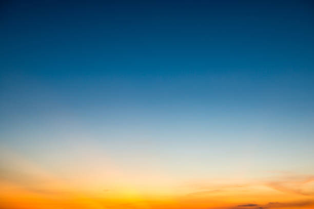 istock Dramatic sunset sky with golden rays. Nature background 1152268184