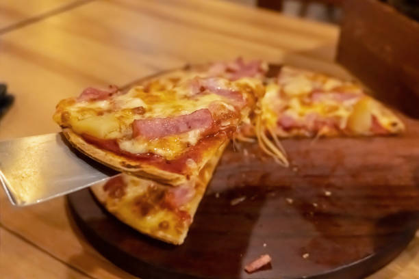 istock Pizza food on wood blurred 1152268557
