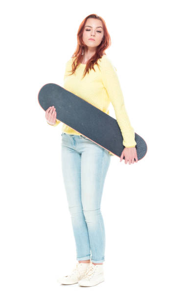 istock Cute female holding a skateboard 1152273516