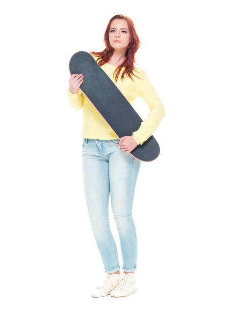 istock Cute female holding a skateboard 1152273527