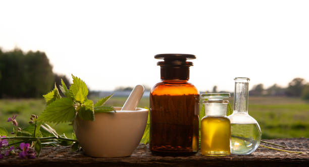 istock Alternative medicine - herbs and oil. 1152279456