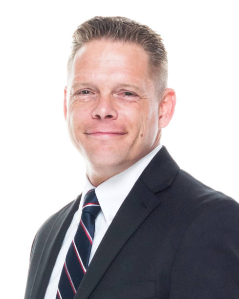 istock Businessman is standing with hands in pockets 1152279779