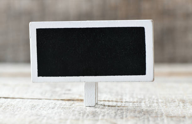 istock close up view of empty chalkboard on wooden backdrop 1152281167